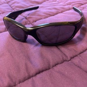 Mens Black Oakley sunglasses- mirrored lenses